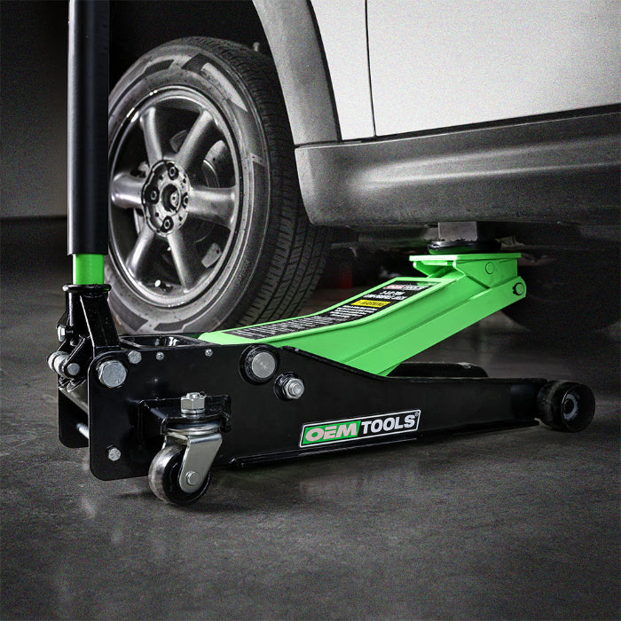 Black and white image of an OEM Tools truck jack where only the truck is colored green.